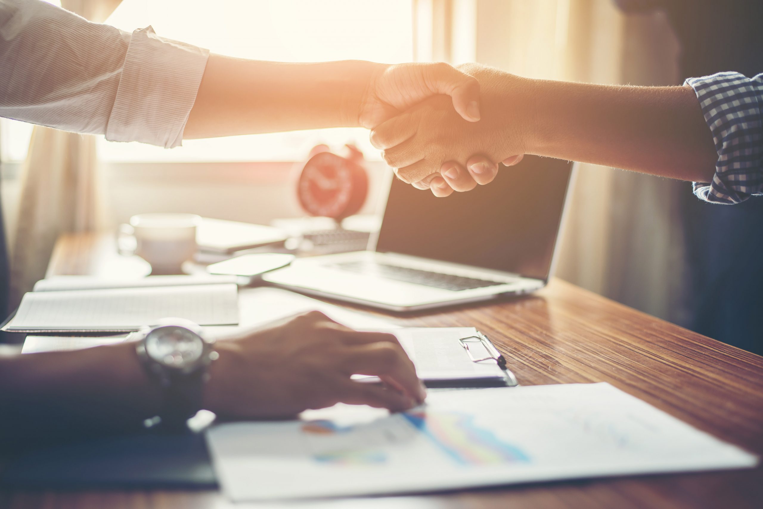 Business People Handshake Greeting Deal at work.